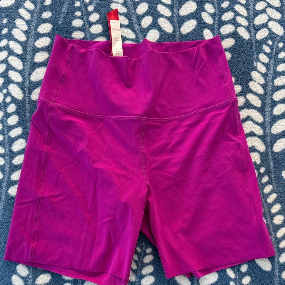 Left on Friday bike shorts. Pink, large NWT